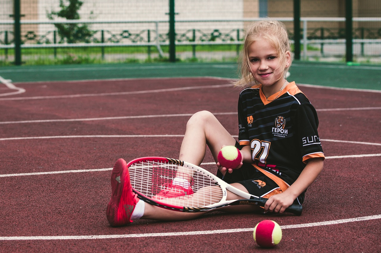 NaÅ¡e dcera takÃ© hraje tenis. 
